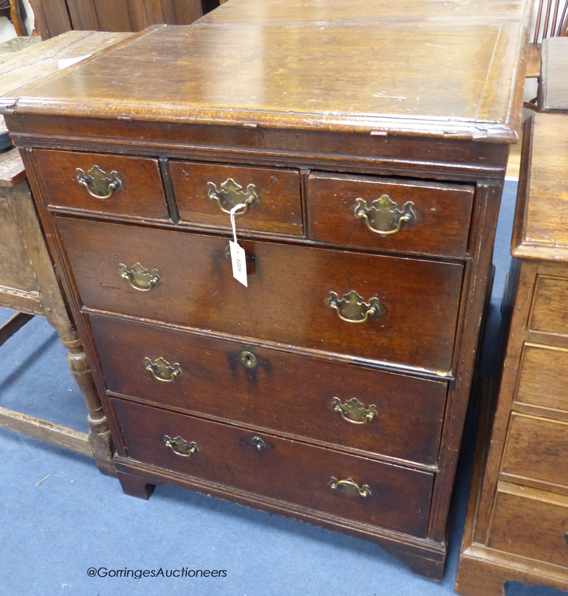A Queen Anne oak chest fitted three short drawers and three long drawers, width 76cm, depth 49cm, height 98cm